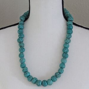 Turquoise colored slag stone bead necklace from Mexico